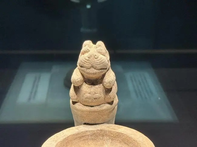 文博日歷丨古人的熨斗上有個會打招呼的瑞獸